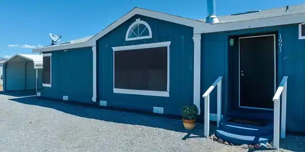 Image 3: This charming home offers a welcoming entrance wit