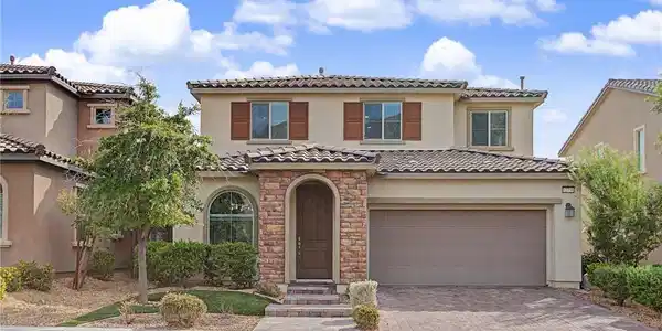 Image 4: Stone accents and a tiled roof complement the hand