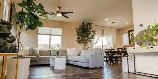 Image 3: Gleaming hardwood floors and a spacious open layou
