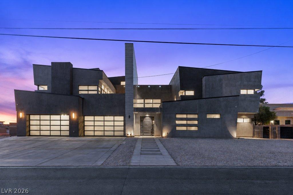 Image 1: Dramatic modern architecture with a striking geome