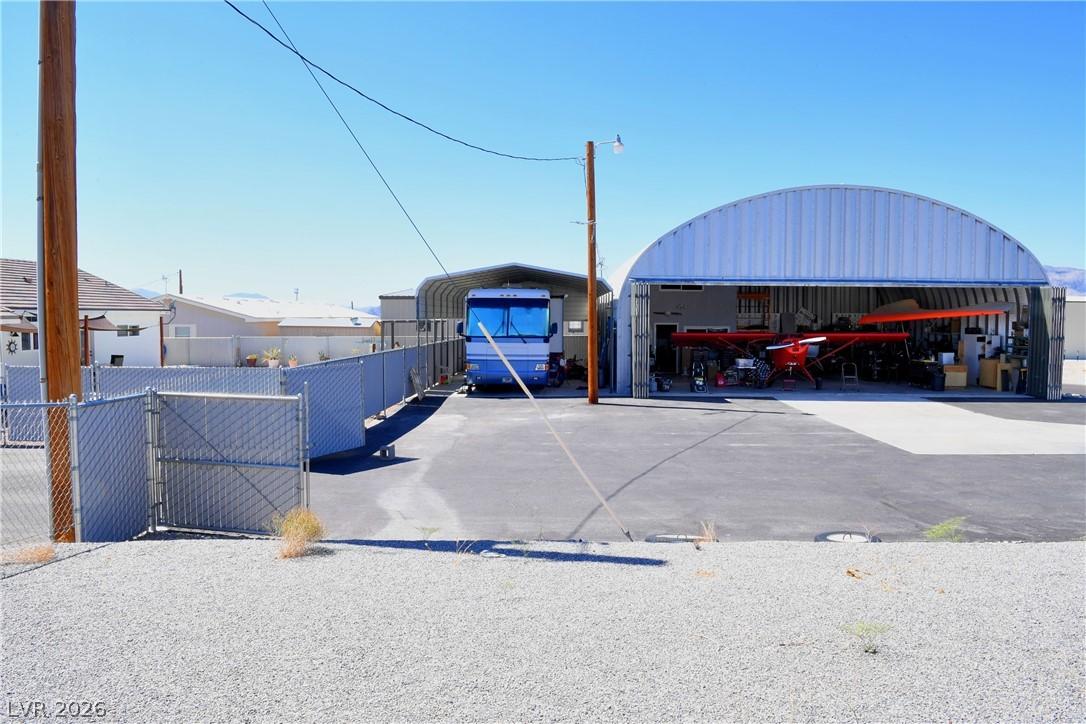 Image 3: This property features a spacious quonset hut, ide