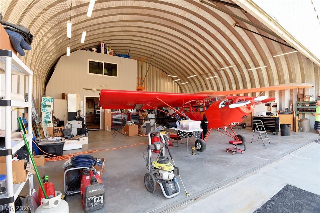 Image 4: Aircraft hangar features robust arch-style constru