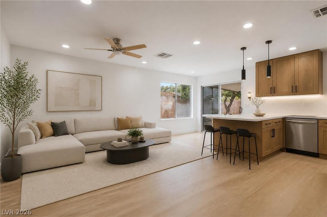 Image 3: Virtually staged. An inviting open-concept living