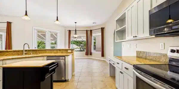 Image 4: A well-appointed kitchen showcasing elegant pendan