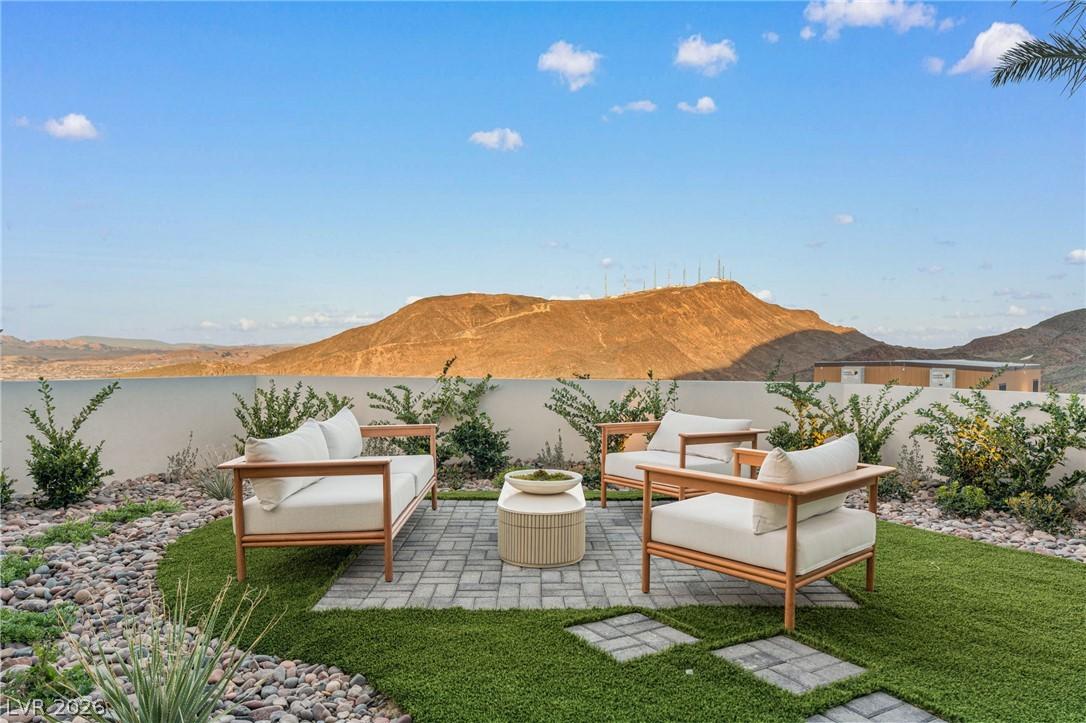 Image 4: A charming patio oasis, ideal for relaxation, with