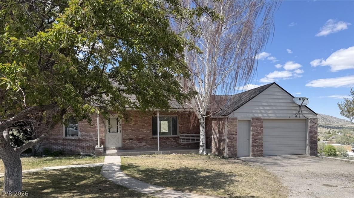 Image 3: Charming brick home featuring a welcoming front po