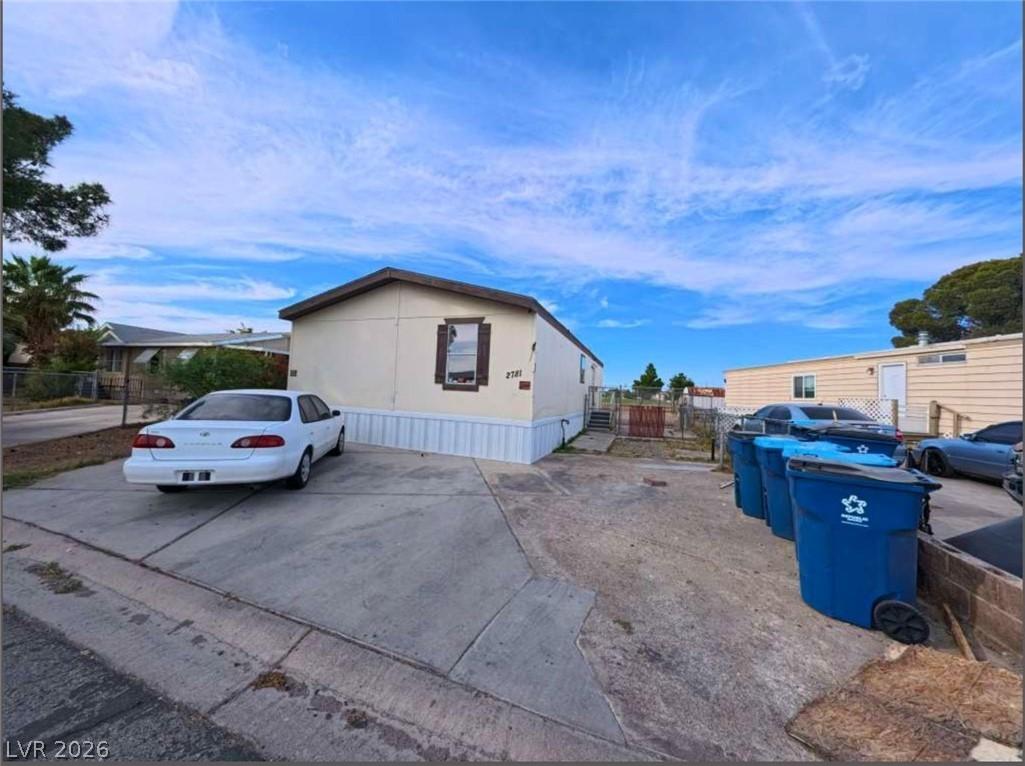 Image 4: This charming home offers convenient parking and e