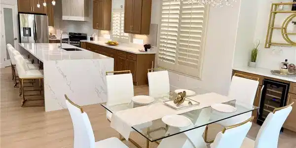 Image 4: A contemporary kitchen offers a spacious island wi