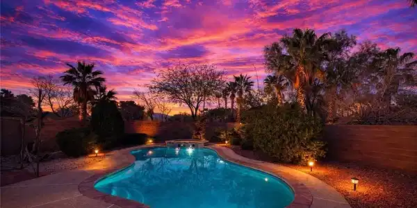 Image 4: Combined pool / hot tub featuring a fenced backyar