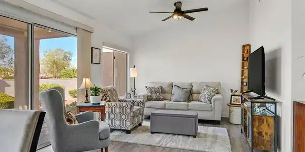 Image 4: Sliding glass doors open directly to the outdoor p