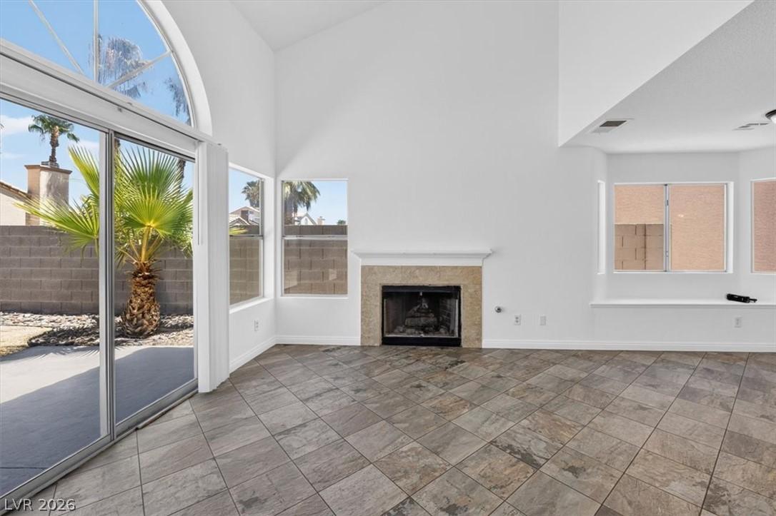 Image 4: Natural light floods this living area through gene