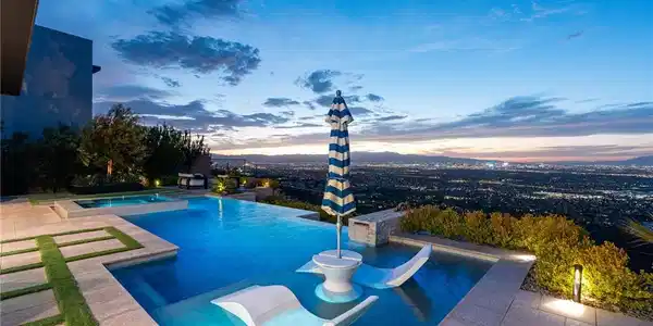 Image 2: An infinity pool looks out over sweeping panoramic