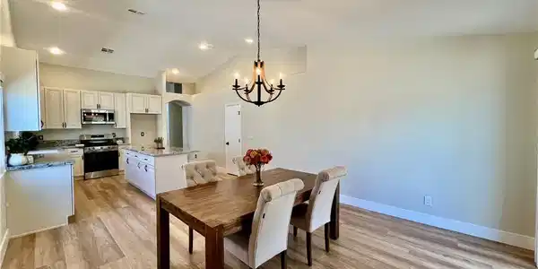 Image 4: An open concept design seamlessly blends the kitch