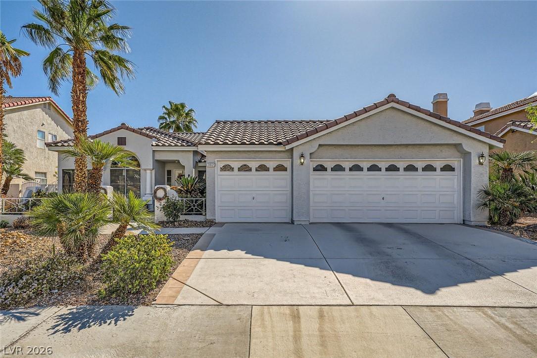 Image 1: This charming home offers convenient garage parkin