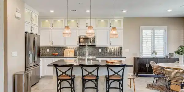 Image 3: An inviting kitchen with a central island and cont