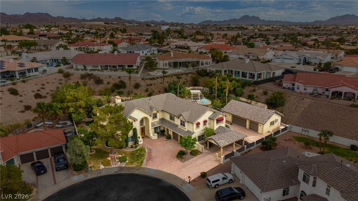 Image 2: An aerial perspective reveals a grand estate nestl