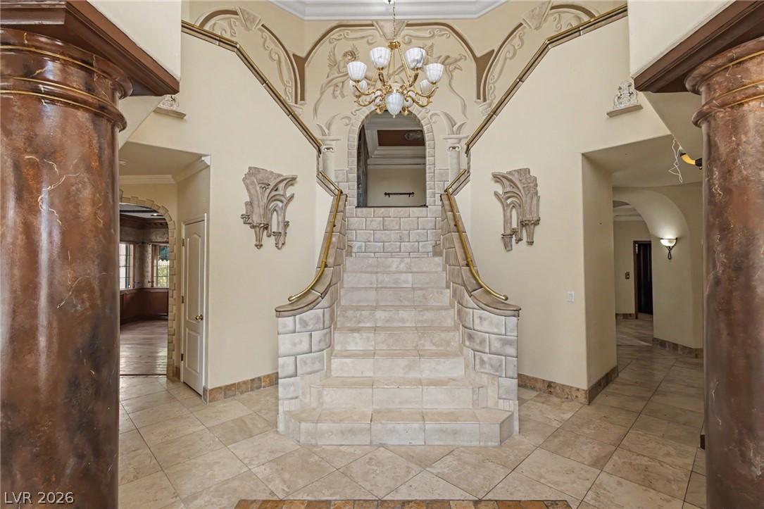 Image 3: Grand double staircase with decorative balustrades