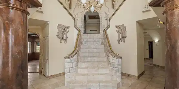 Image 3: Grand double staircase with decorative balustrades