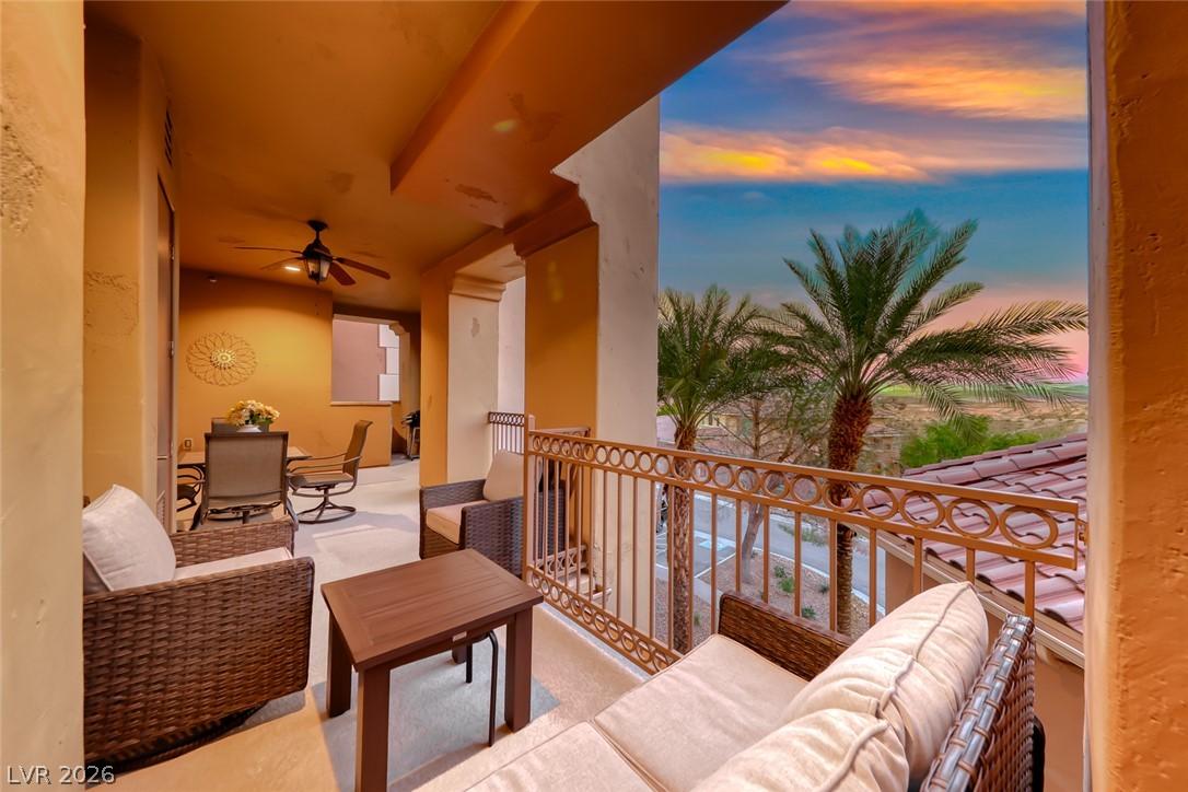 Image 1: An inviting balcony offers serene outdoor living w