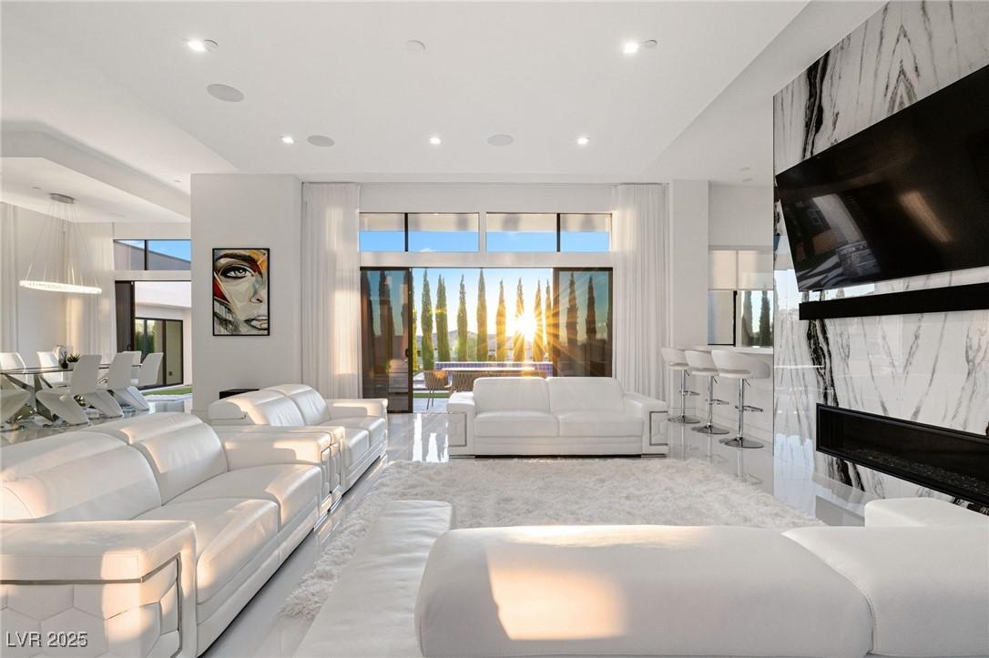 Image 4: Living room featuring recessed lighting