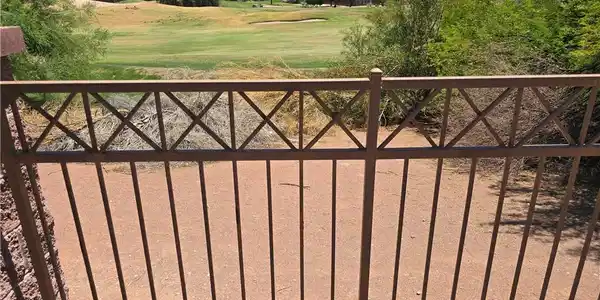 Image 3: Golf course vistas await from beyond the secure ga