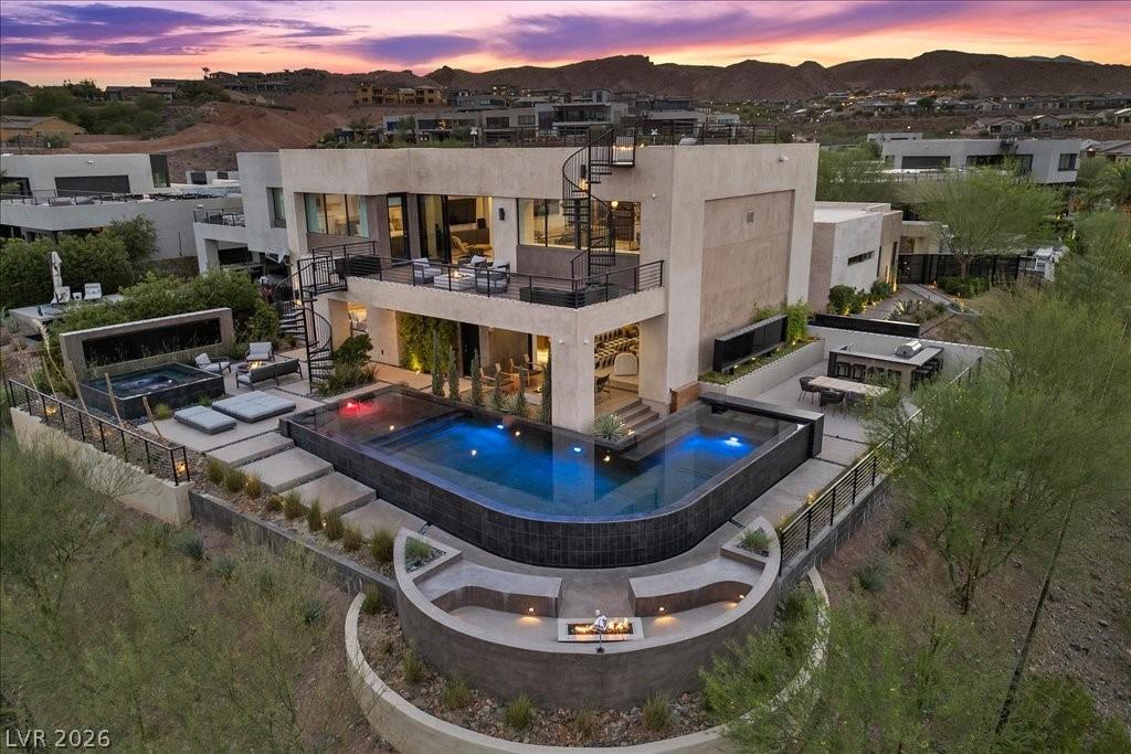 Image 1: This desert contemporary home boasts luxurious out