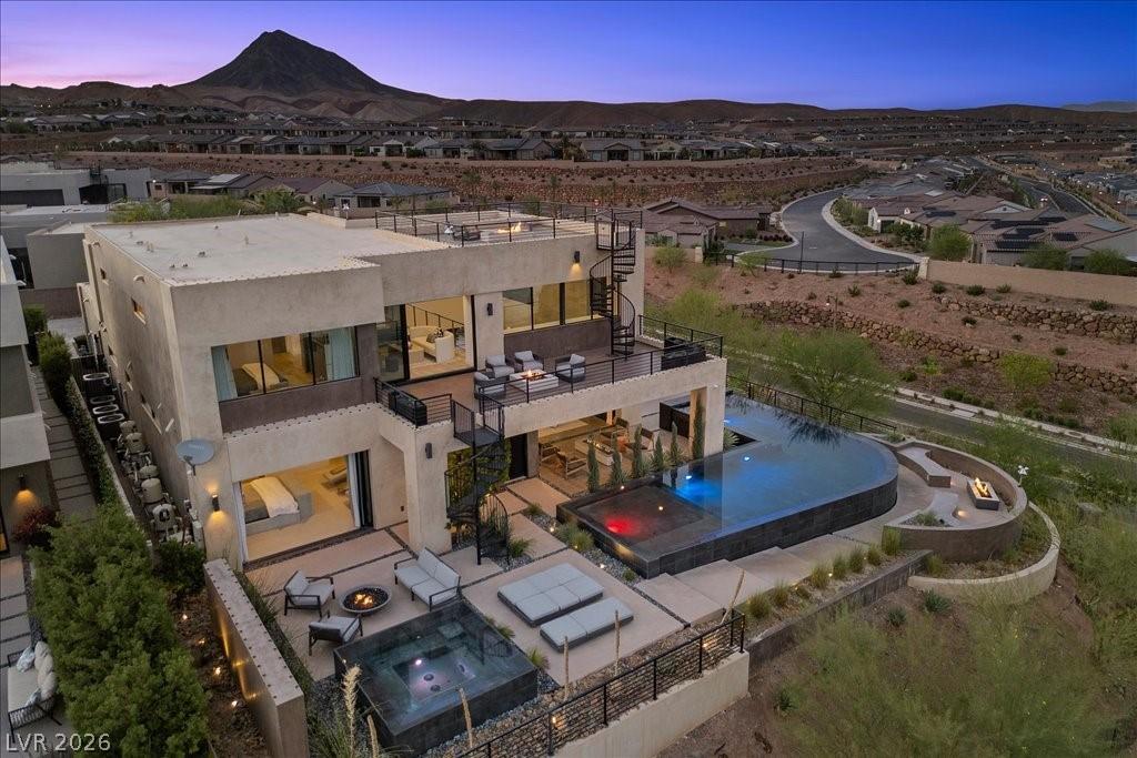 Image 2: An aerial perspective reveals a contemporary resid