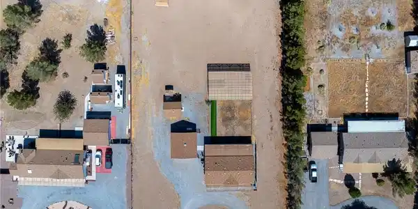 Image 2: An aerial perspective reveals a vast desert landsc