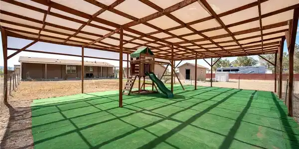 Image 3: A spacious desert property offers vast open land w