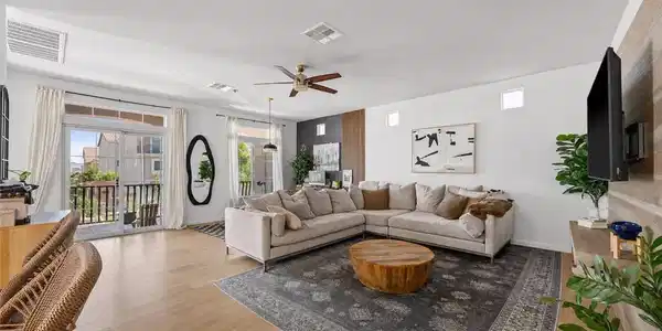 Image 2: A welcoming living area featuring durable hardwood