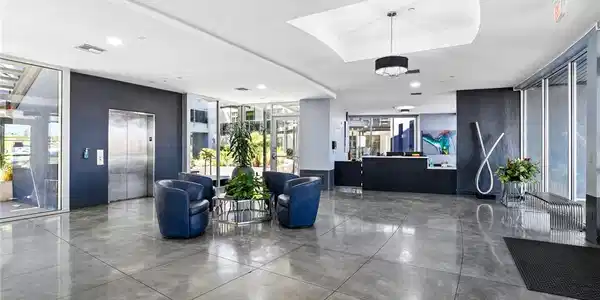 Image 4: Polished concrete floors and floor-to-ceiling glas