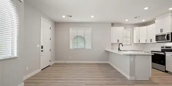 Image 3: Clean lines and smooth flooring define this open d