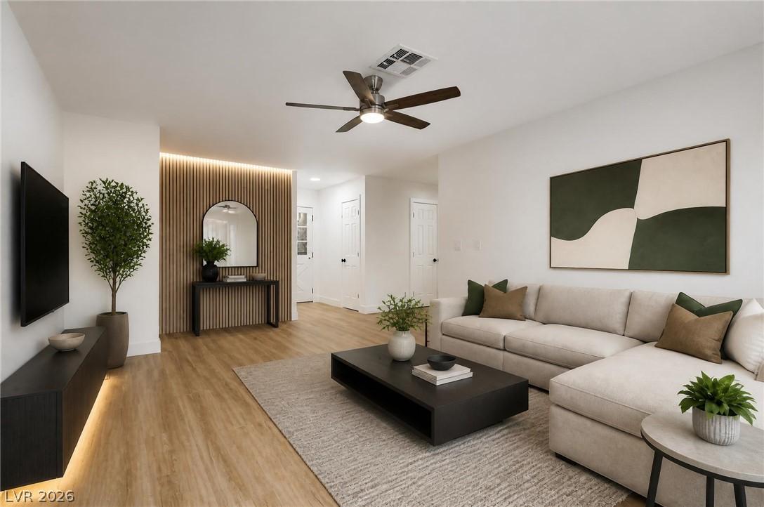 Image 4: Virtually staged. A refined living space features