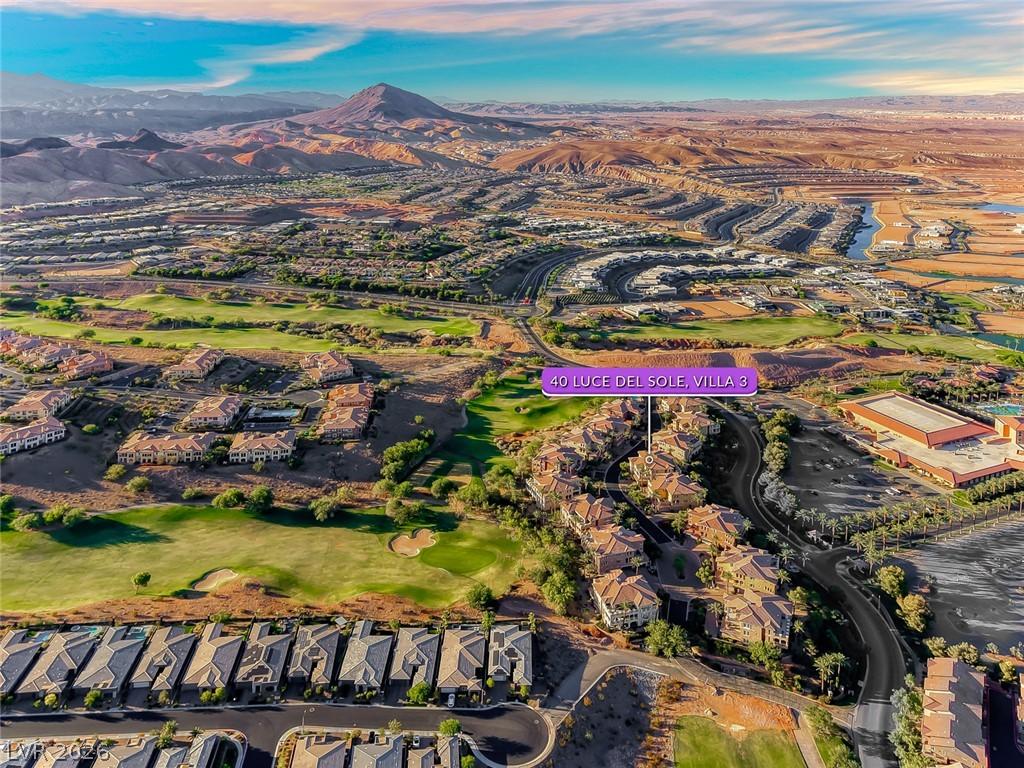 Image 2: Discover expansive golf course vistas with mountai