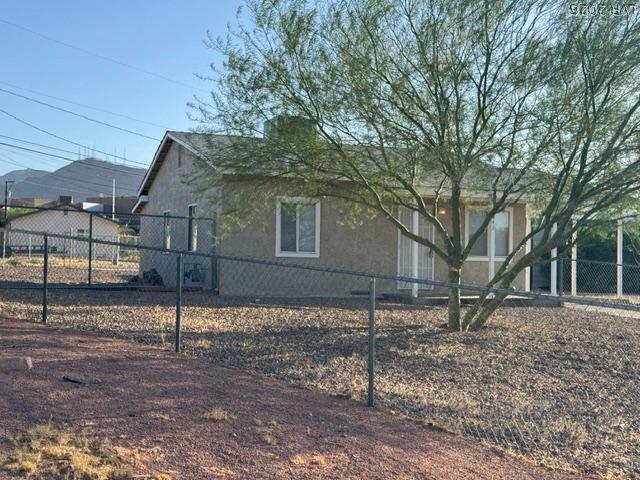 Image 2: Secure yard space with privacy fencing offers ampl