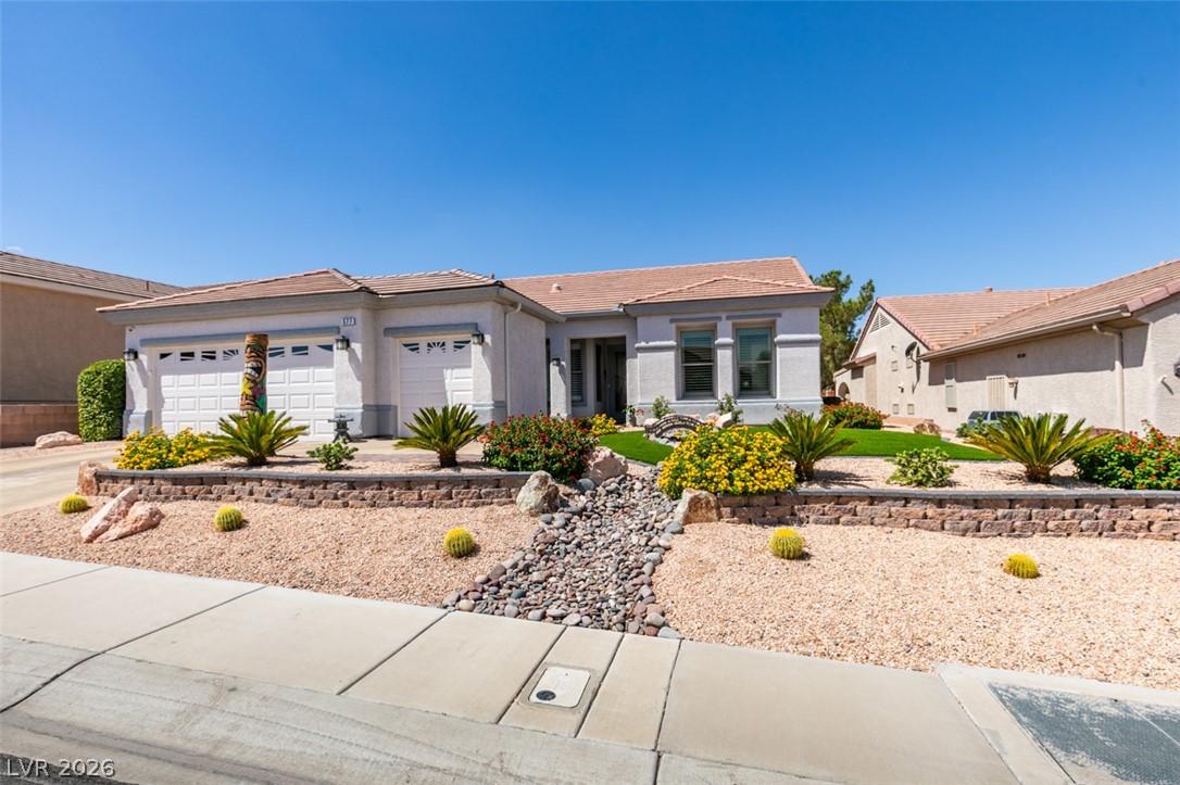Image 2: A gracefully maintained landscaping that leads to
