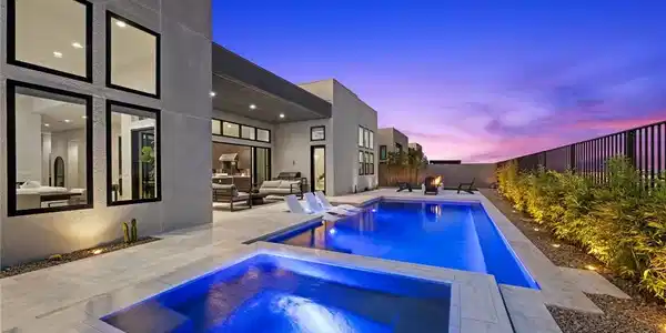 Image 2: A sparkling geometric pool and spa define this mod