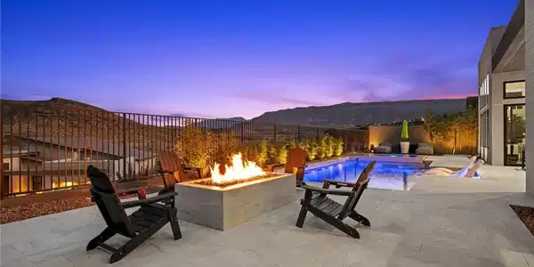 Image 3: An inviting outdoor living space features a modern