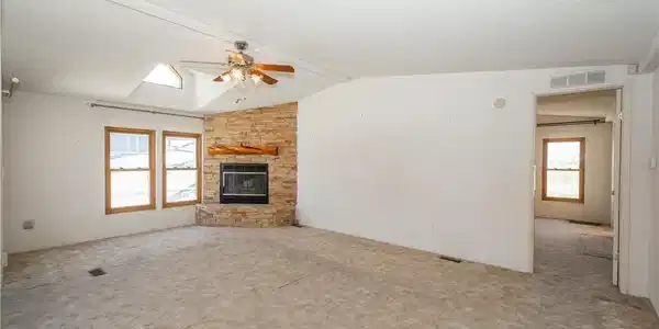Image 3: Warm and inviting living space with a corner stone