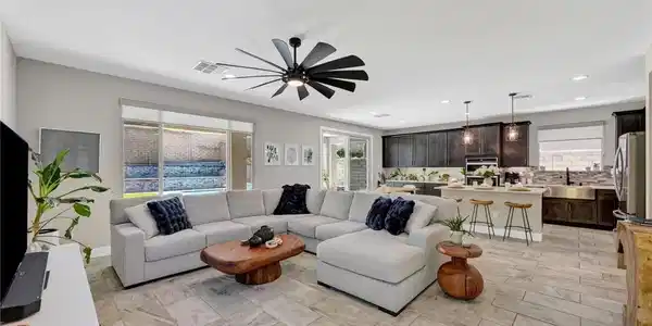 Image 4: An open floorplan seamlessly connects the living s
