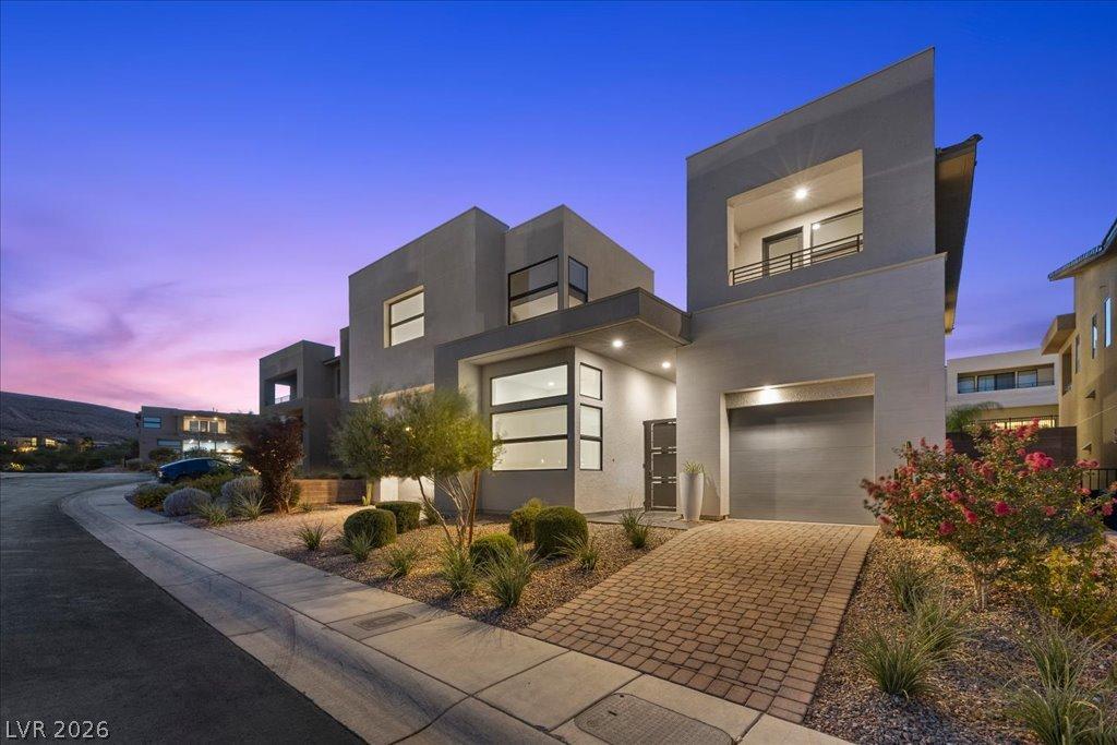Image 3: Modern architecture with clean lines and mature la