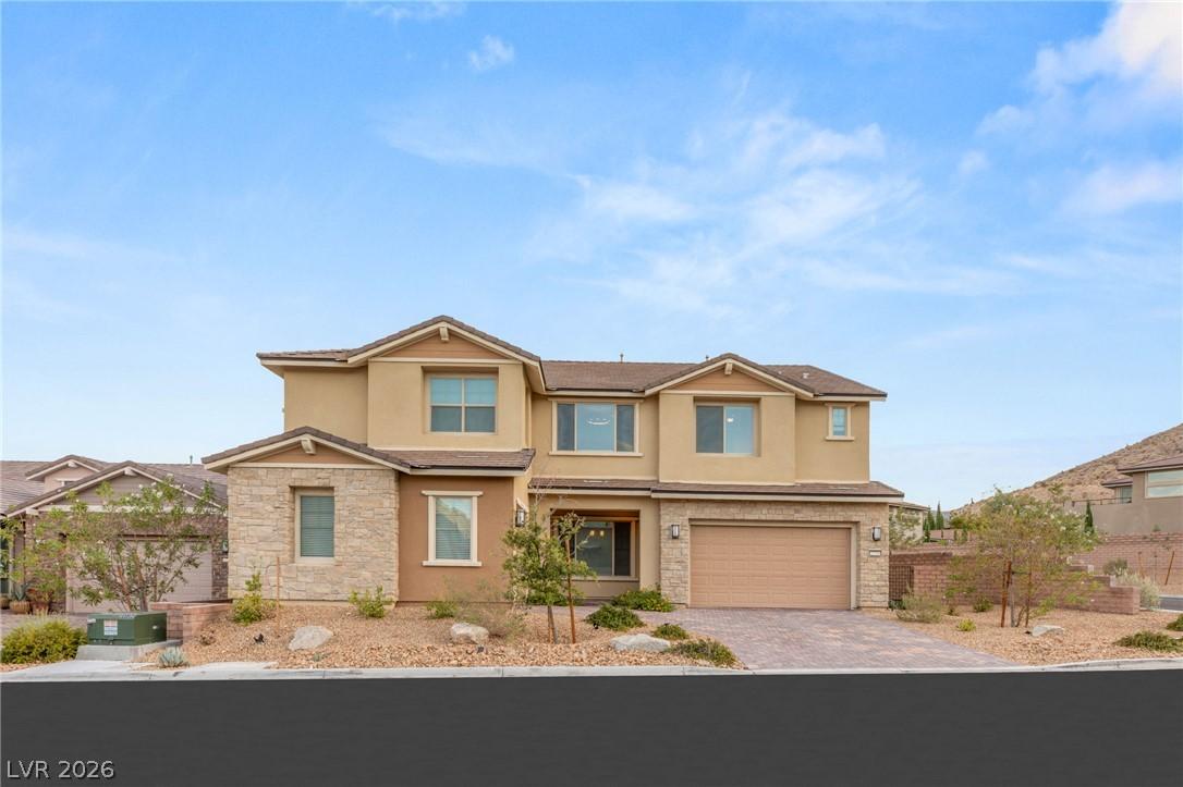 Image 2: A desert-modern residence with warm earth tones an