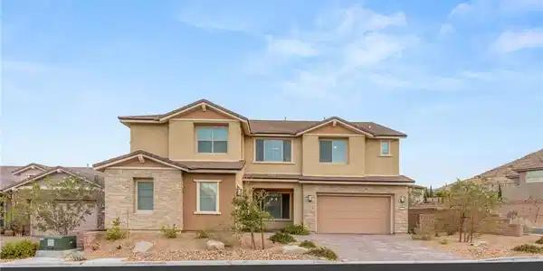 Image 2: A desert-modern residence with warm earth tones an