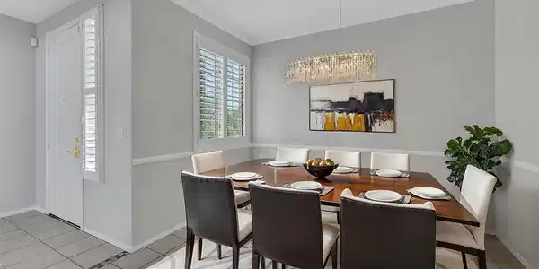 Image 3: Tiled floors and elegant crown molding define this