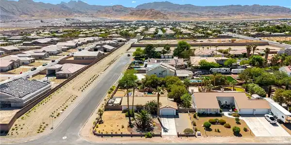 Image 3: An aerial perspective reveals a desert neighborhoo