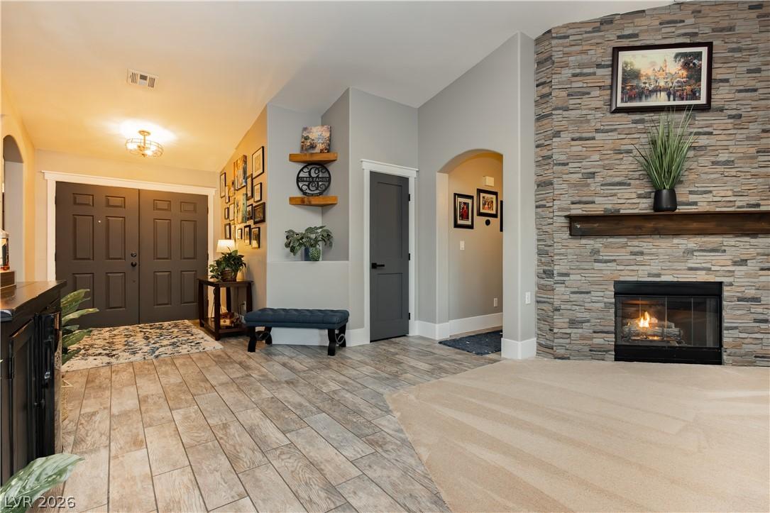 Image 4: A welcoming entryway with durable wood-look tile f