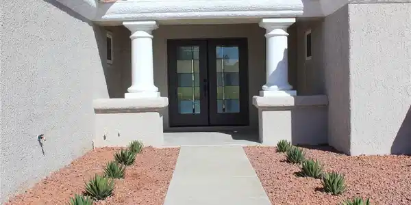 Image 4: Enter this home through a grand entrance featuring