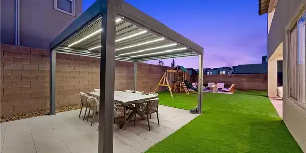 Image 3: Entertain guests under the illuminated pergola or