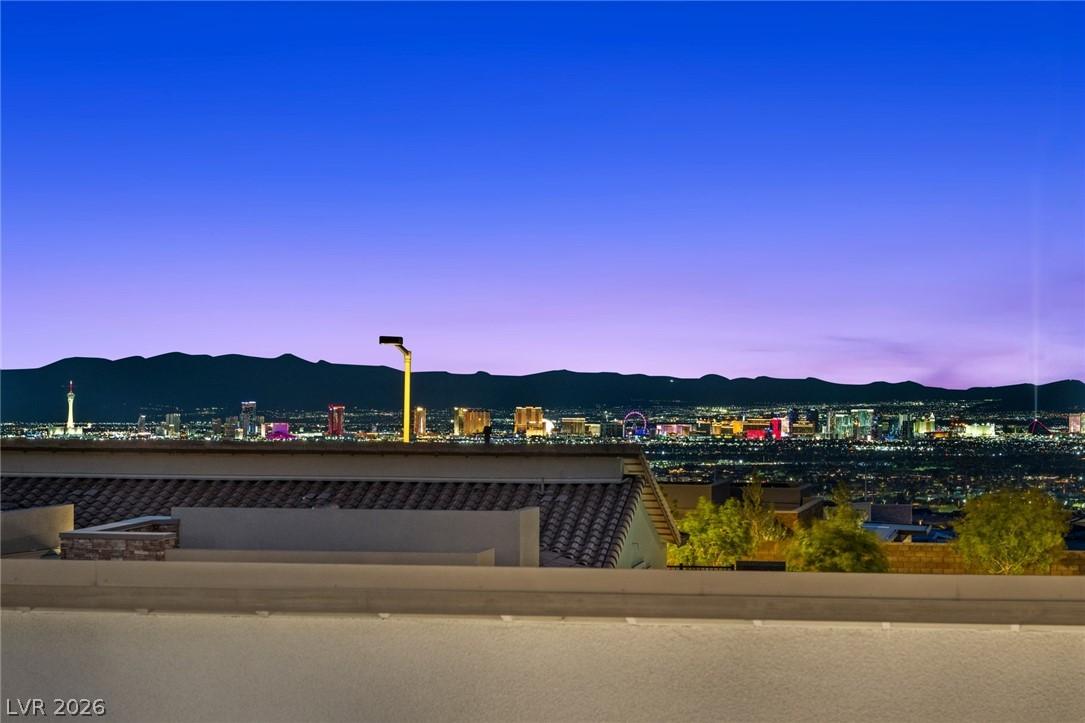 Image 4: Witness the captivating nocturnal glow of a city s