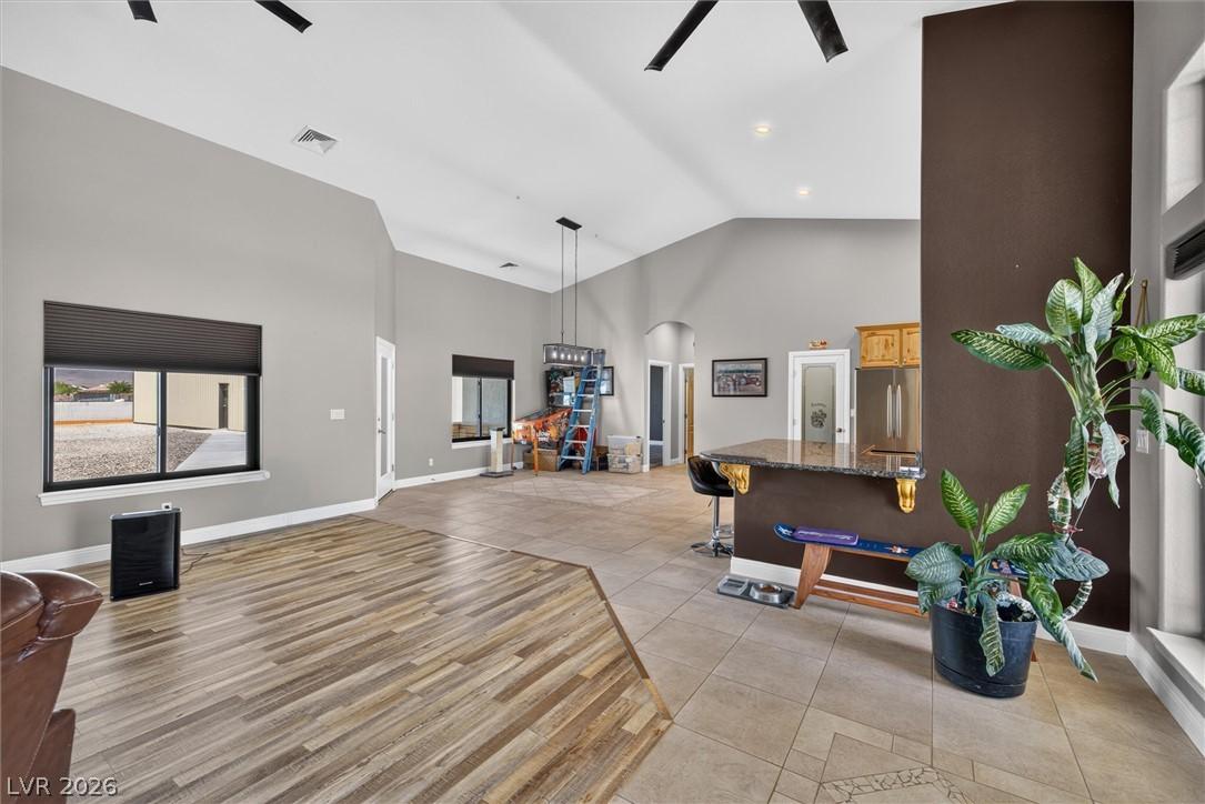 Image 4: A spacious great room offers an inviting atmospher